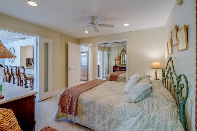 bedroom with recessed lighting, a closet, ceiling fan, stainless steel fridge, and baseboards