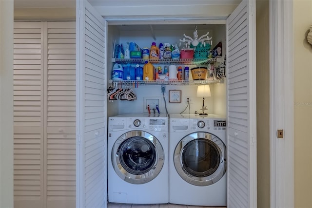 laundry room with laundry area and separate washer and dryer