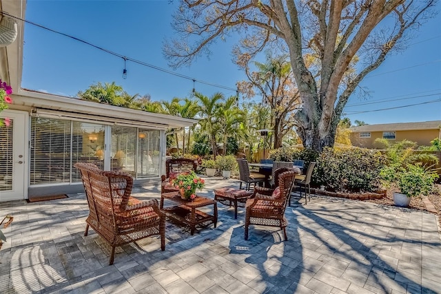 view of patio / terrace with outdoor dining area and outdoor lounge area