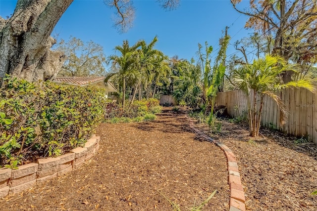 view of yard with fence