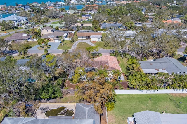 bird's eye view with a water view and a residential view