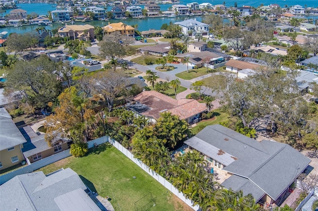 aerial view with a residential view and a water view