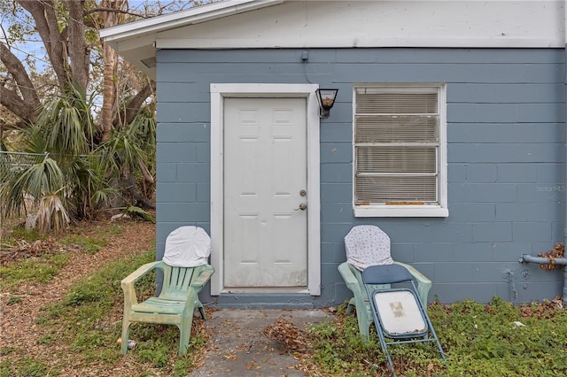 776 18th Ave S, Saint Petersburg, FL 33705 - property entrance featuring concrete block siding