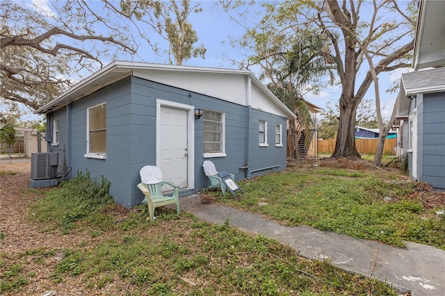 776 18th Ave S, Saint Petersburg, FL 33705 - view of front of home with central AC unit and fence