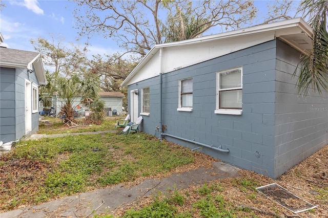 776 18th Ave S, Saint Petersburg, FL 33705 - view of side of home with concrete block siding