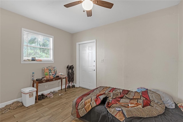 776 18th Ave S, Saint Petersburg, FL 33705 - bedroom with ceiling fan, light wood finished floors, and baseboards