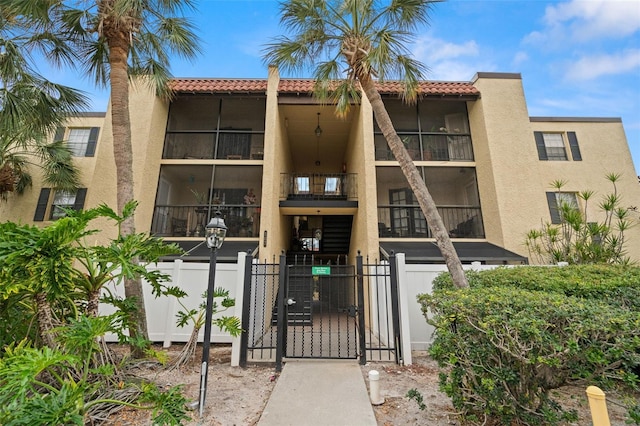 view of building exterior with a fenced front yard