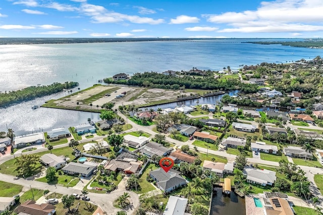 aerial view with a water view and a residential view