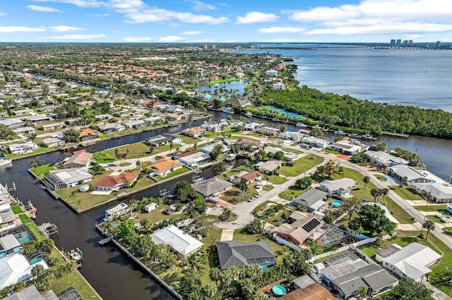 aerial view featuring a water view and a residential view