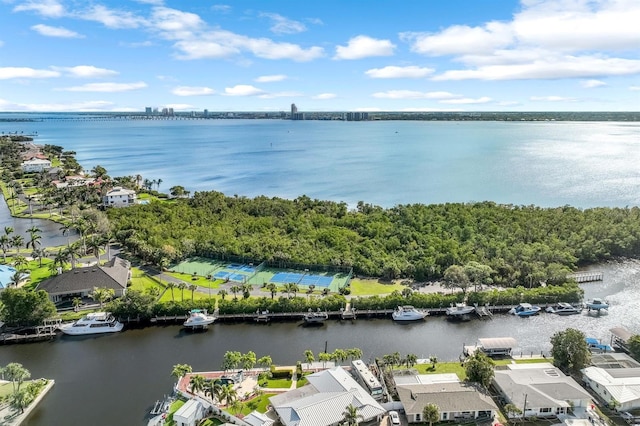 birds eye view of property featuring a water view