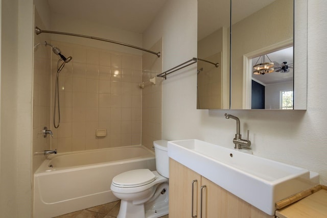 bathroom featuring tub / shower combination, vanity, toilet, and tile patterned floors