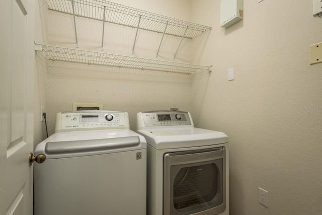 laundry area with laundry area and washer and dryer