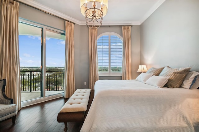 bedroom with a chandelier, access to outside, crown molding, and wood finished floors