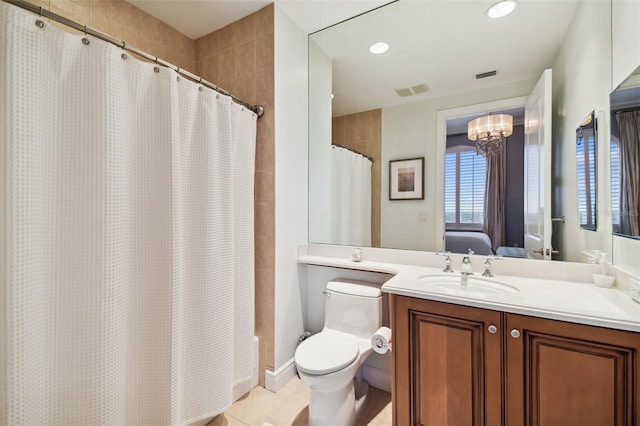 full bath featuring curtained shower, toilet, ensuite bathroom, vanity, and tile patterned flooring