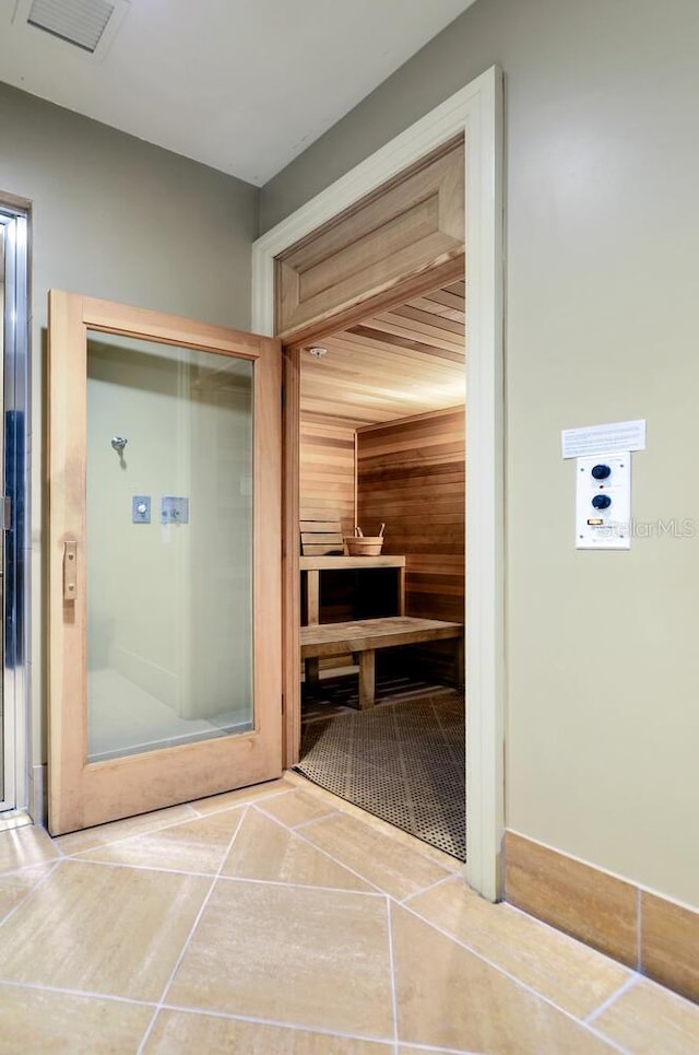 view of sauna with tile patterned flooring