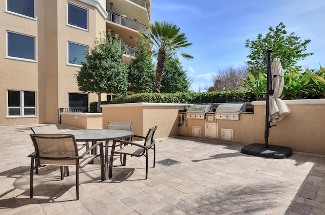 view of patio / terrace featuring outdoor dining space and area for grilling