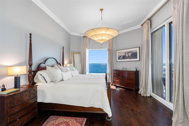 bedroom with ornamental molding and dark wood-type flooring