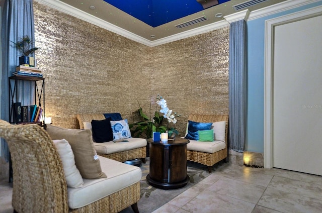 sitting room featuring visible vents and crown molding