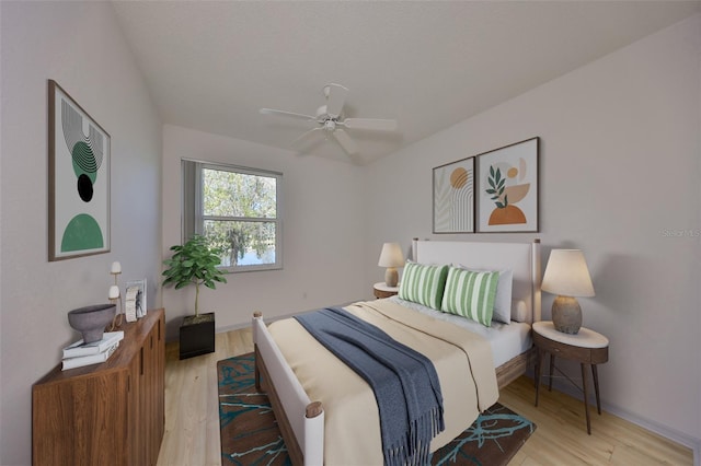 bedroom featuring light wood-type flooring and ceiling fan