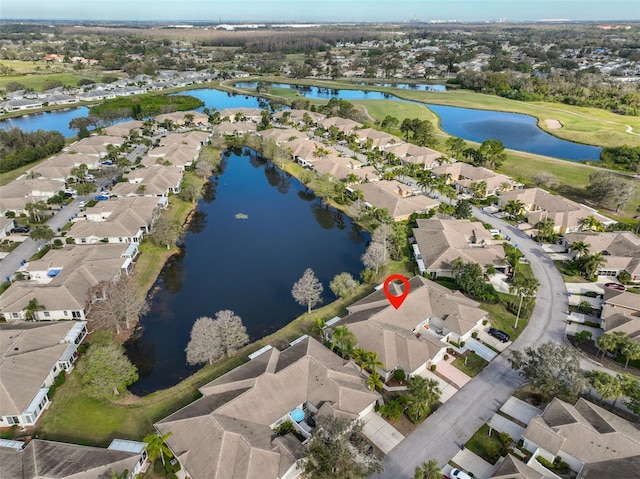 bird's eye view with a water view and a residential view