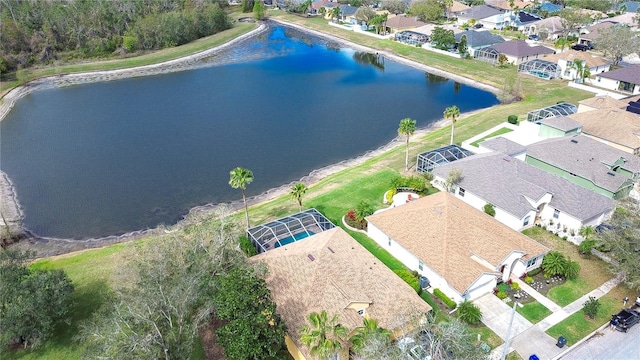 aerial view with a residential view and a water view