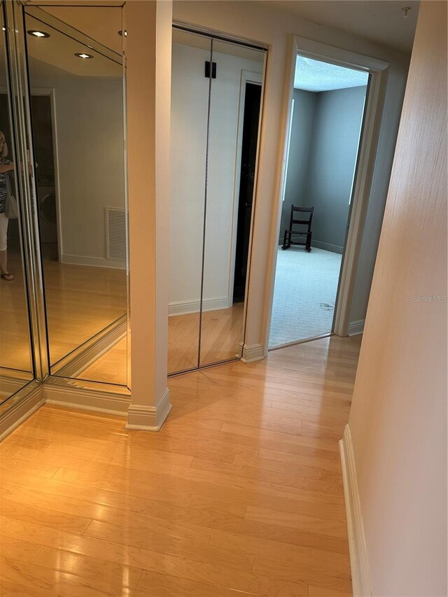 6425 Shoreline Dr Unit 10506, Saint Petersburg, FL 33708 - hall featuring light wood-style floors and recessed lighting