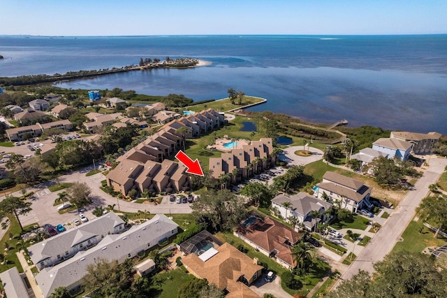 bird's eye view with a water view and a residential view