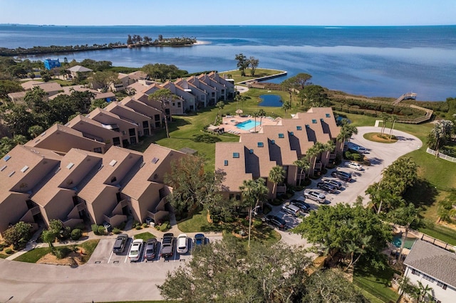 aerial view with a water view and a residential view