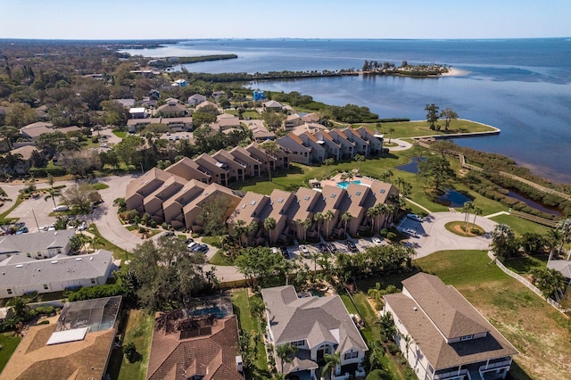 bird's eye view with a water view and a residential view