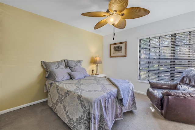 bedroom featuring carpet floors, ceiling fan, and baseboards