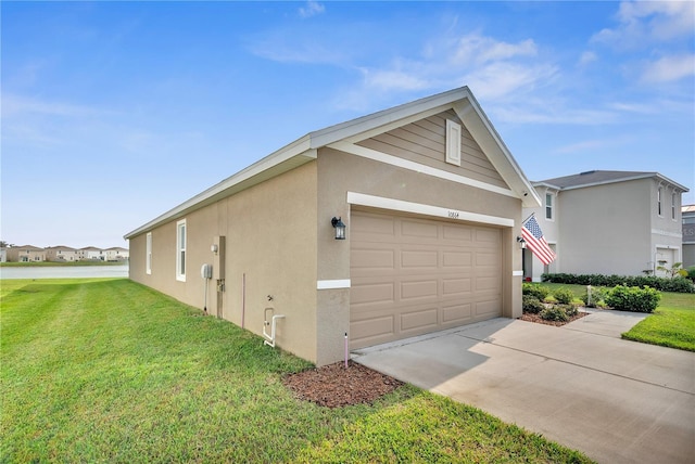 view of property exterior featuring stucco siding, a lawn, an attached garage, and driveway