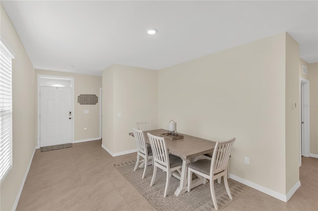 dining space featuring light tile patterned floors, visible vents, baseboards, and recessed lighting