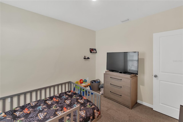 bedroom featuring carpet flooring, baseboards, and visible vents