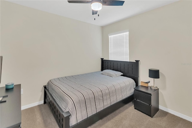 bedroom featuring carpet flooring, baseboards, and ceiling fan