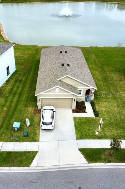 aerial view featuring a water view