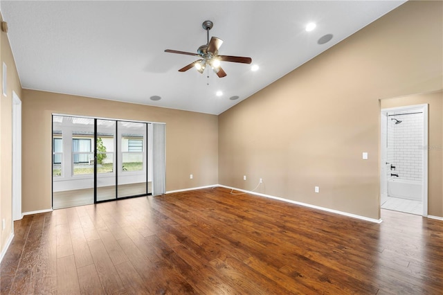 empty room featuring dark wood finished floors, baseboards, and ceiling fan