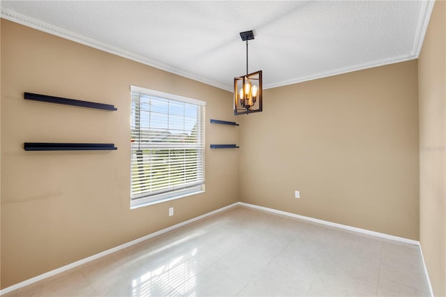 spare room with a notable chandelier, crown molding, light tile patterned flooring, a textured ceiling, and baseboards