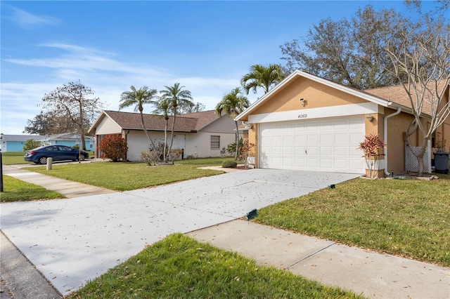 single story home with driveway, an attached garage, a front yard, and stucco siding