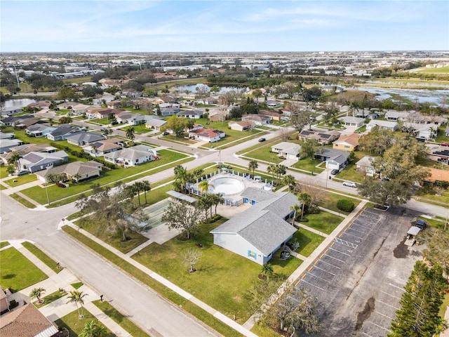 aerial view featuring a water view and a residential view