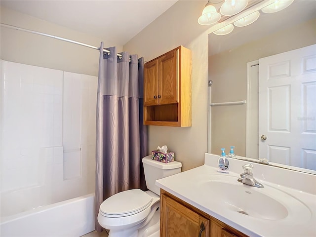 bathroom featuring shower / tub combo, vanity, and toilet