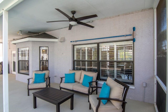 view of patio featuring an outdoor hangout area and a ceiling fan