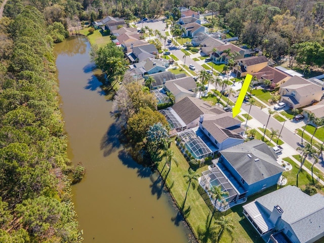 aerial view with a water view and a residential view