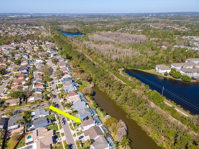 bird's eye view with a residential view and a water view