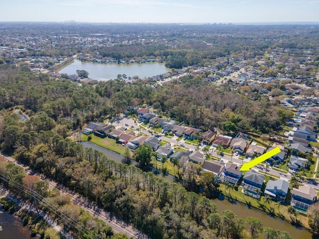 aerial view with a water view and a residential view