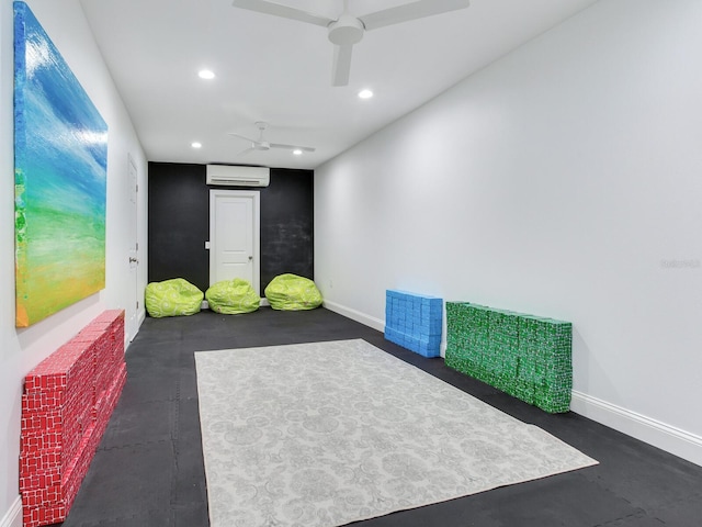 exercise area with recessed lighting, baseboards, a ceiling fan, and a wall mounted air conditioner