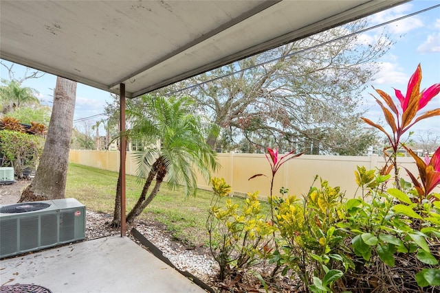 view of patio / terrace featuring central AC and a fenced backyard