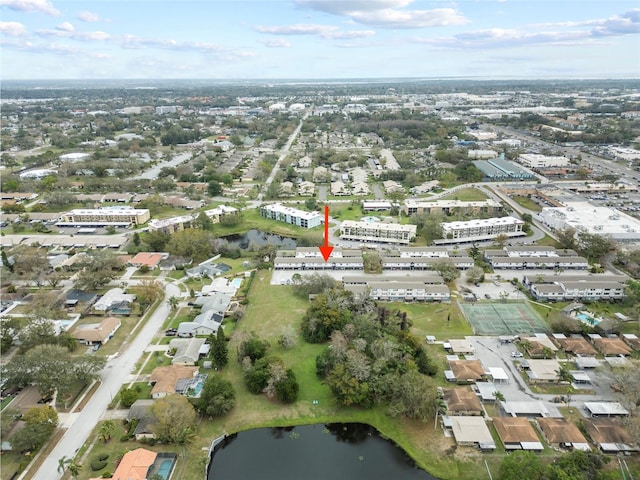 birds eye view of property featuring a residential view and a water view