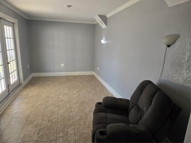 sitting room with a healthy amount of sunlight, light tile patterned floors, baseboards, and ornamental molding