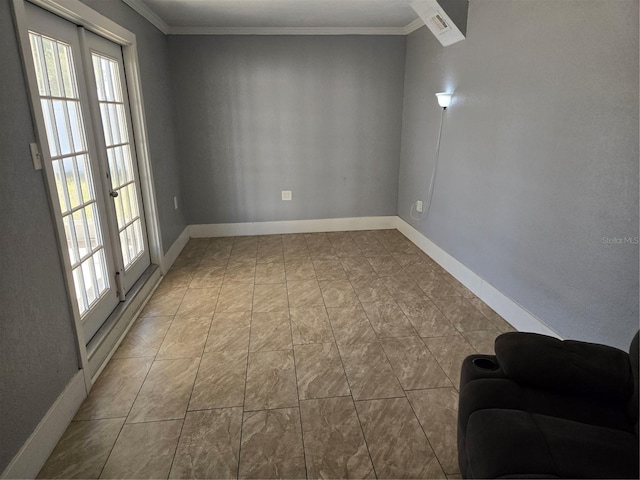 unfurnished room featuring baseboards, plenty of natural light, and crown molding