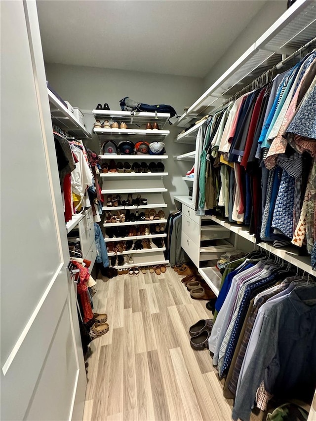 walk in closet featuring light wood-type flooring